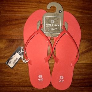 Third Oak coral flip flops